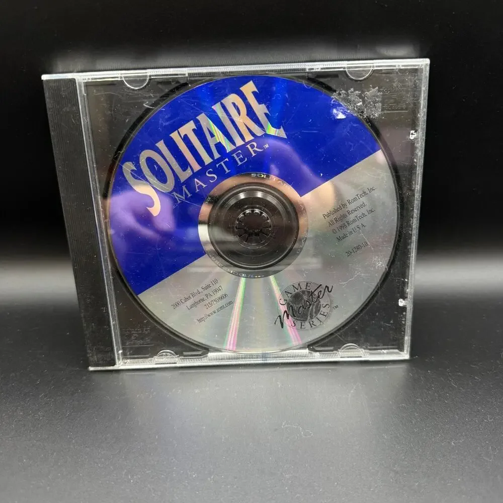 PC Mixed Game Lot of 4 Solitaire Wheel of Fortune Prime Suspects Trophy Bass